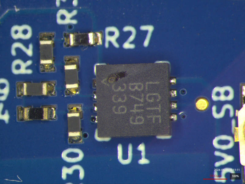 DFN packaged LTC4367 on PCB with an obvious crater near pin 1 where the magic smoke escaped